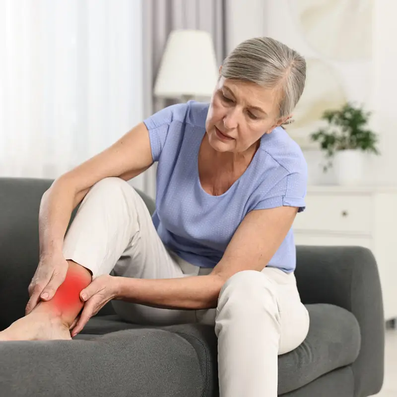 Senior woman suffering from pain in ankle